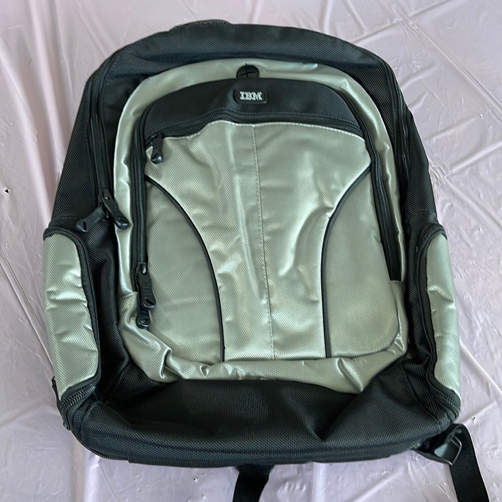 Backpack, NWOT, zipped, pockets, multi colored,